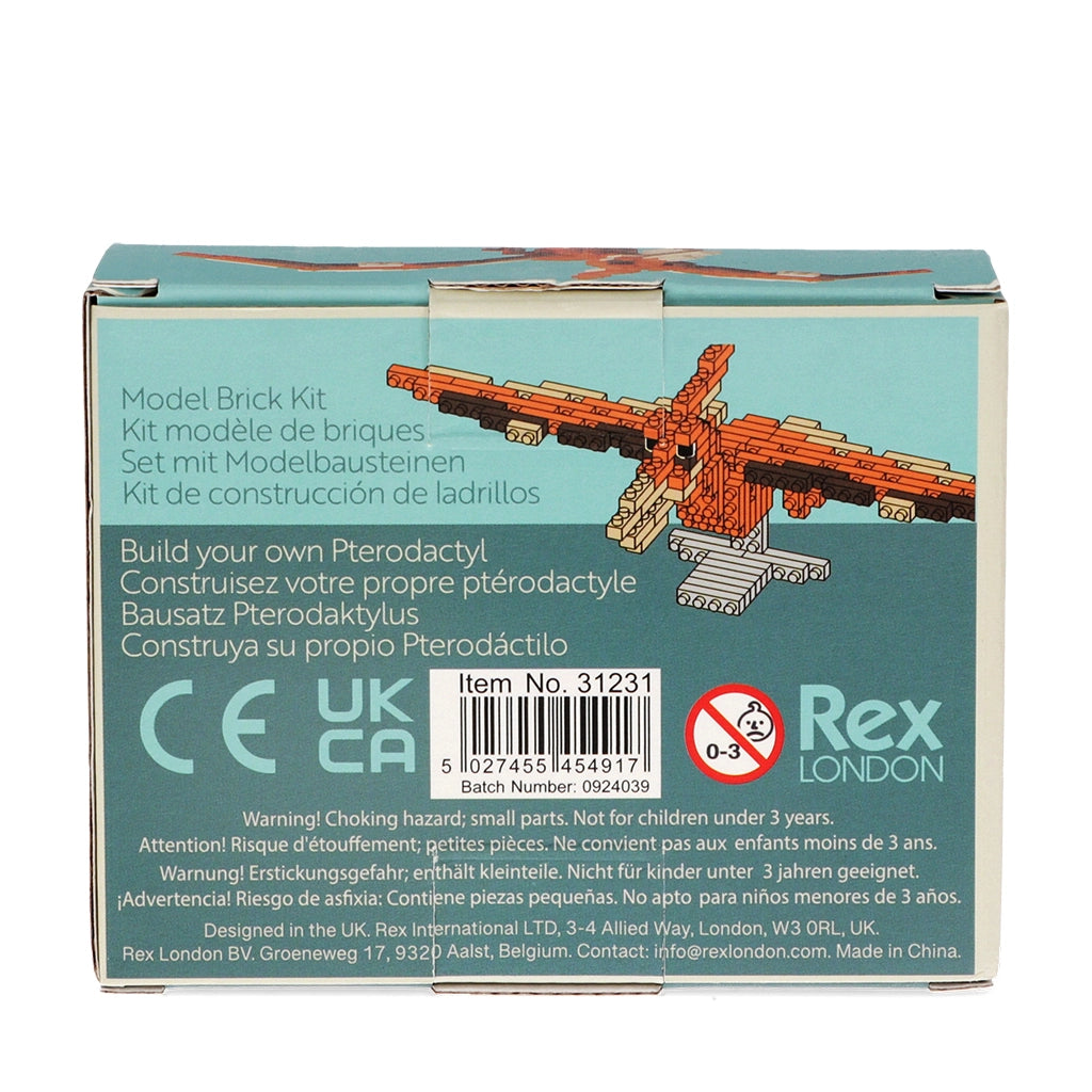 Back of Pterodactyl Dinosaur Brick Kit box showing multilingual details and safety info.