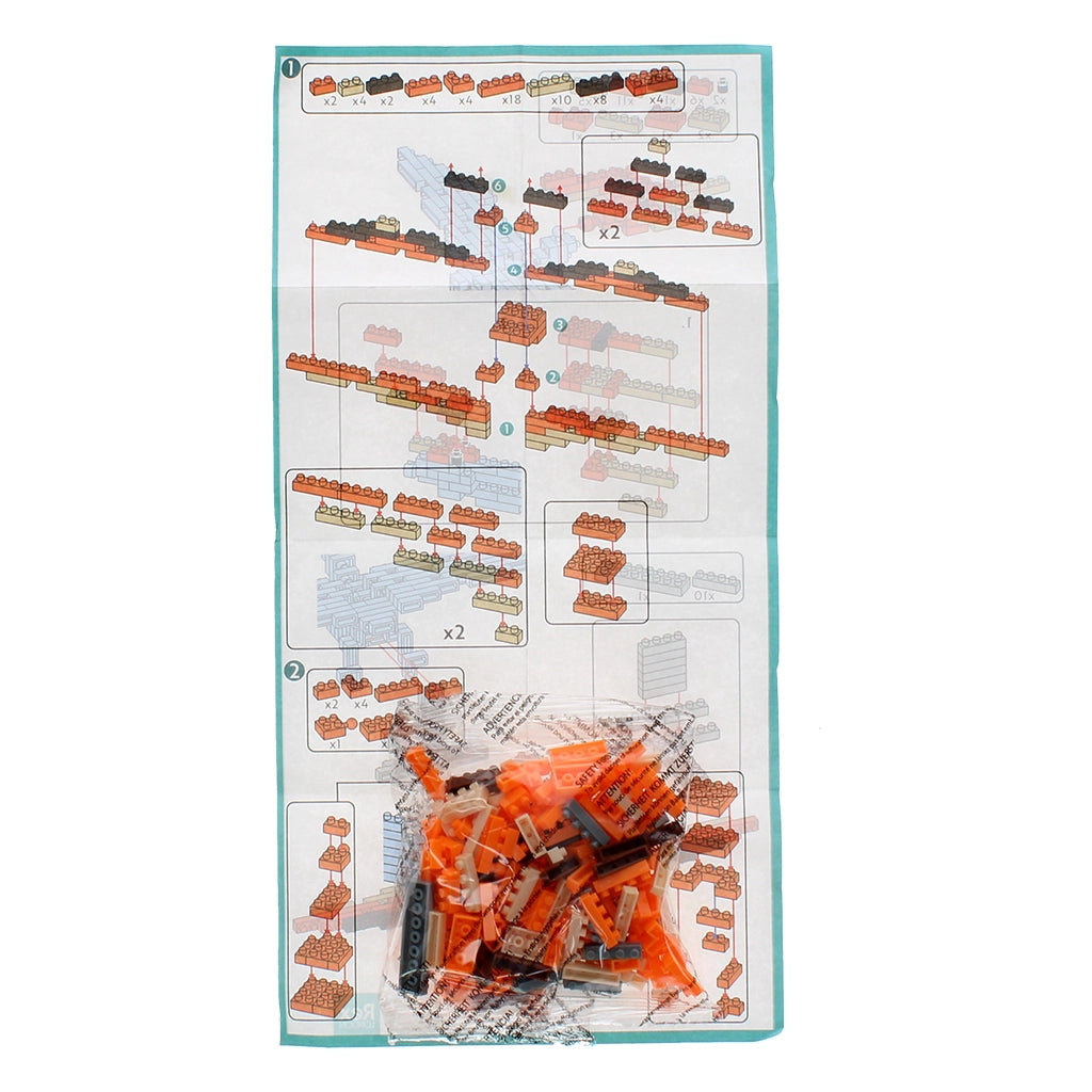Instruction sheet and packet of orange, white, and grey micro bricks from Pterodactyl kit.