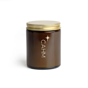 Amber glass CAHM candle jar with gold lid – Clove, Orange & Cedarleaf fragrance, luxury soy wax candle.