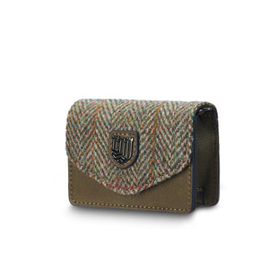 Chestnut Herringbone: Chestnut herringbone card case with Harris Tweed® and a green vegan leather trim.