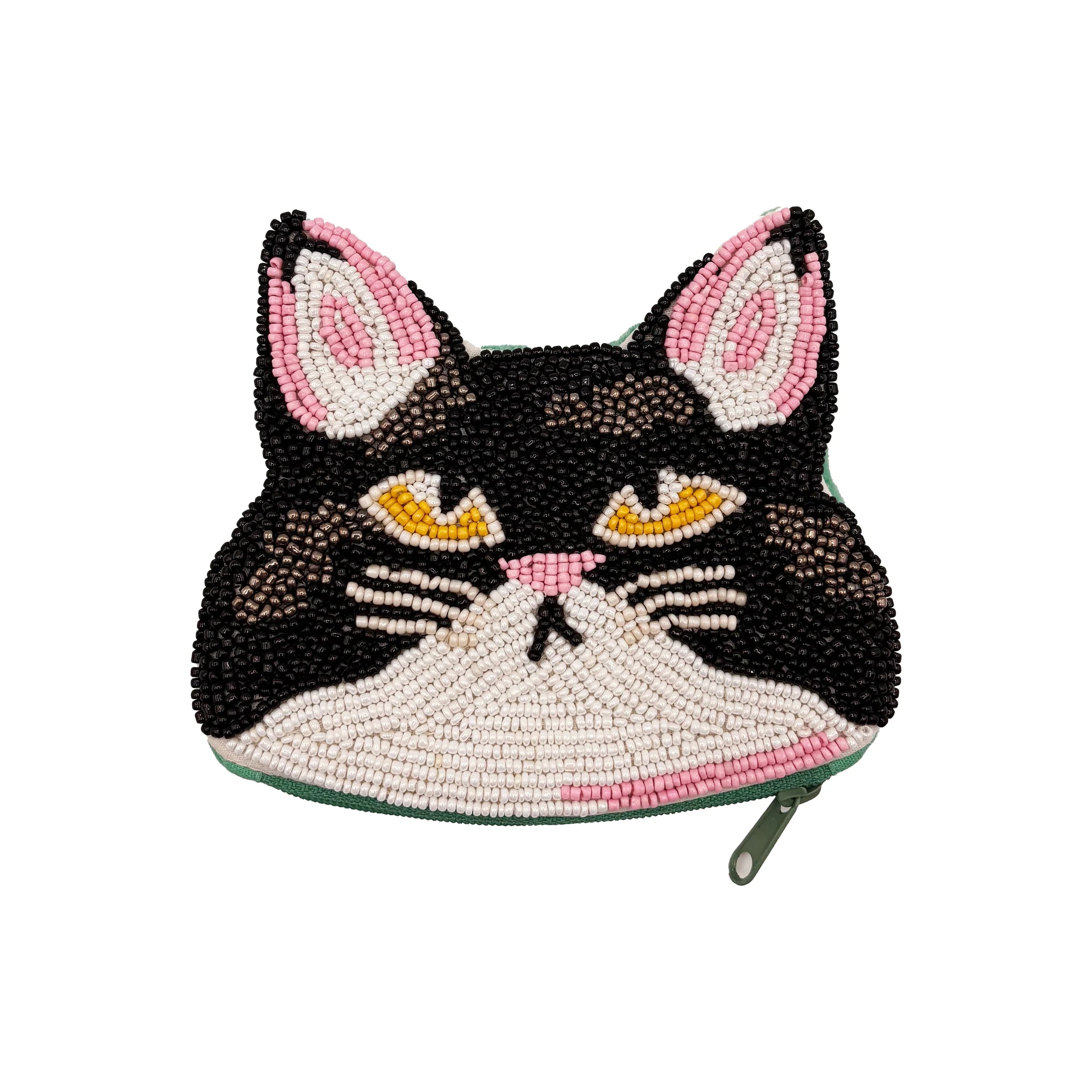 Close-up of Catnip Cat Coin Purse featuring hand-beaded black-and-white cat with pink ears.