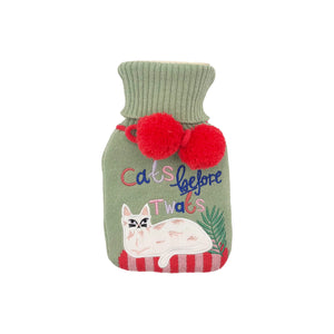 Front view of sage green Cats Before Twats hot water bottle with red pom-poms and embroidered cat.