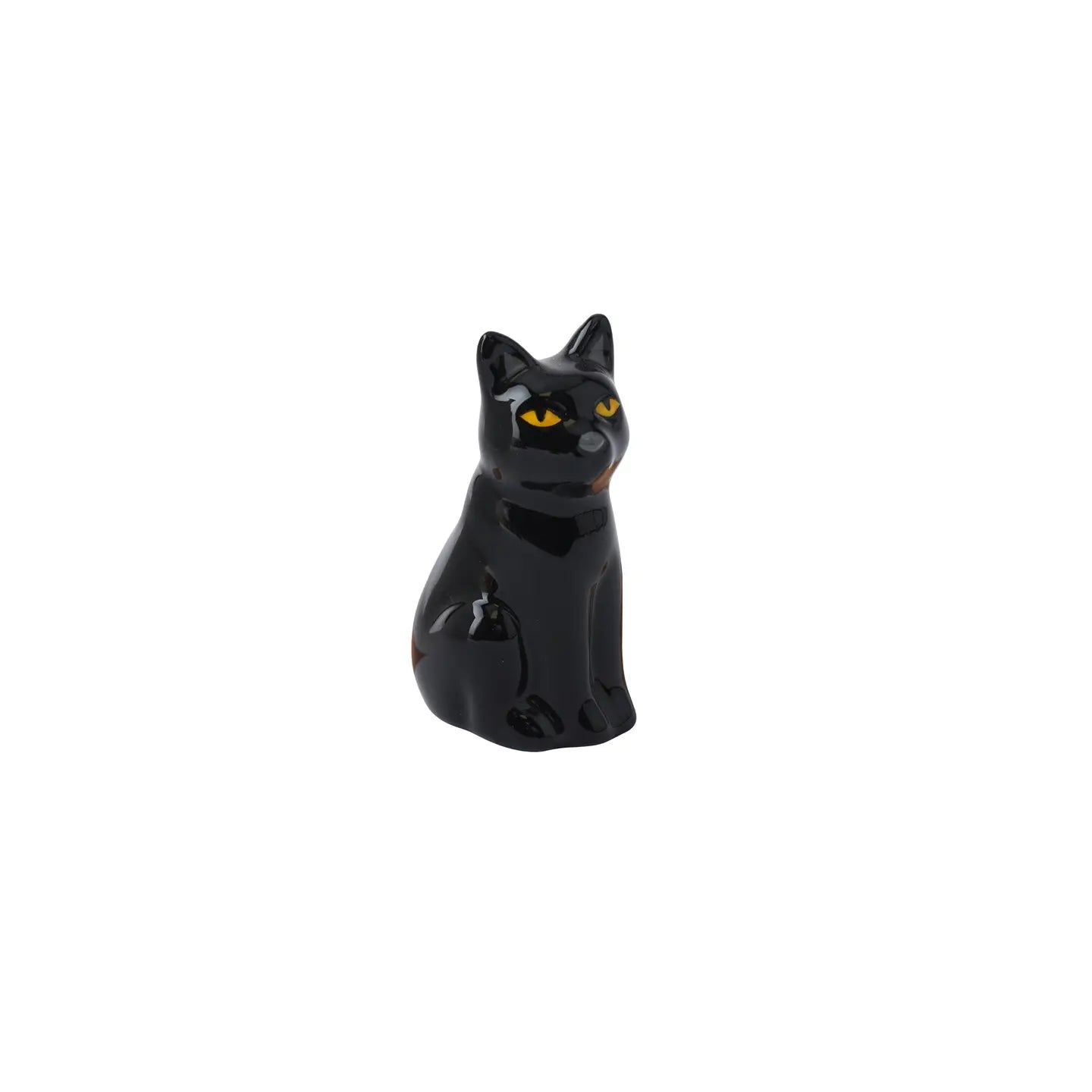 Sleek black ceramic cat ornament facing forward with amber eyes.