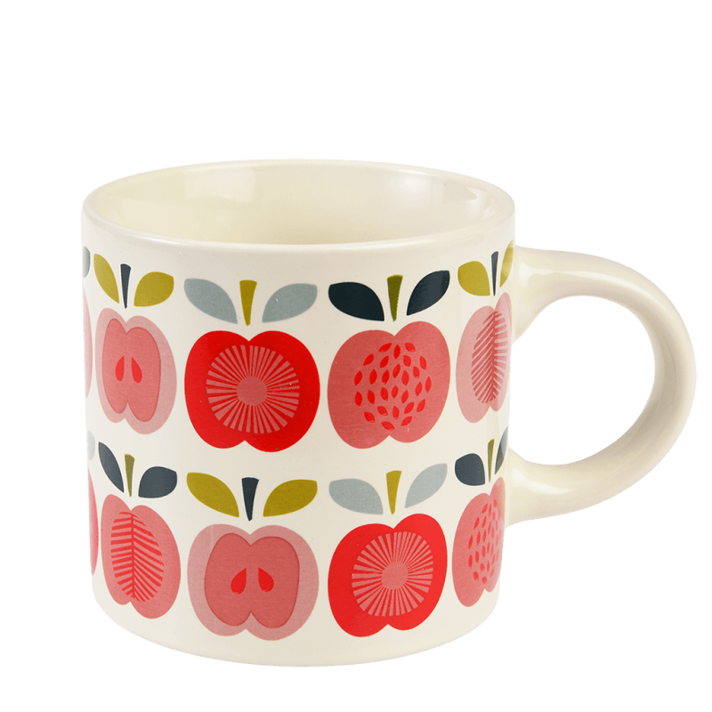 Side view of ceramic mug featuring colourful red and pink apple designs with stylised leaves.