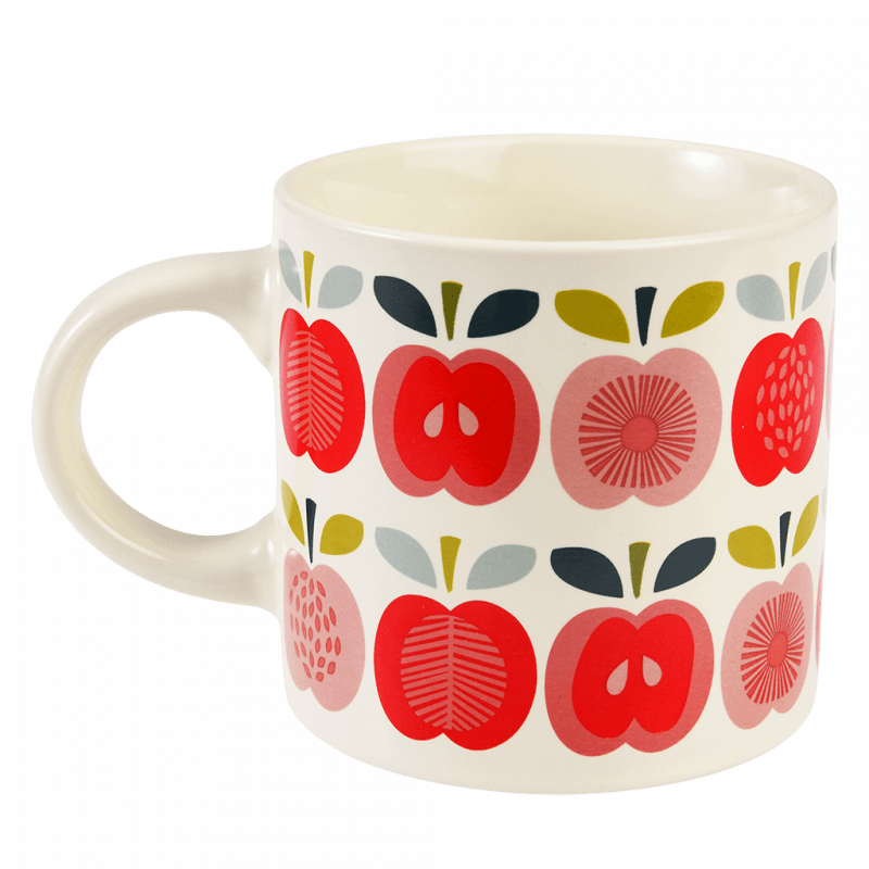 Angled shot of Vintage Apple ceramic mug highlighting the playful mid-century print.