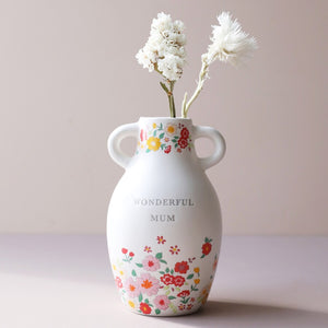 Ceramic Wonderful Mum Floral Vase with white dried flowers, styled on a neutral background.