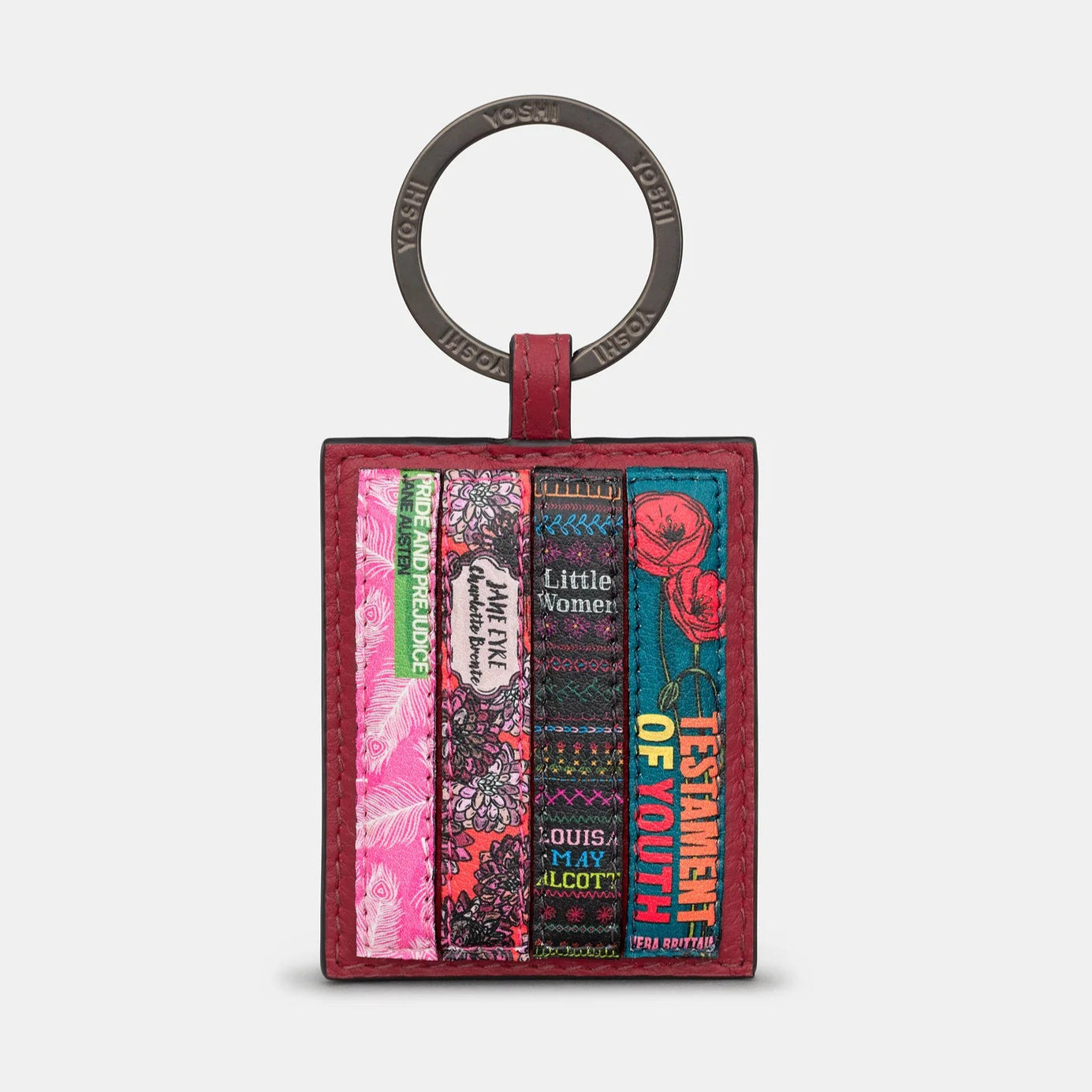 Front of cherry red leather keyring with book spine appliqué design featuring titles by iconic female authors.