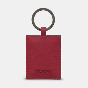 Back view of red leather keyring with embossed Yoshi logo and soft grain finish.