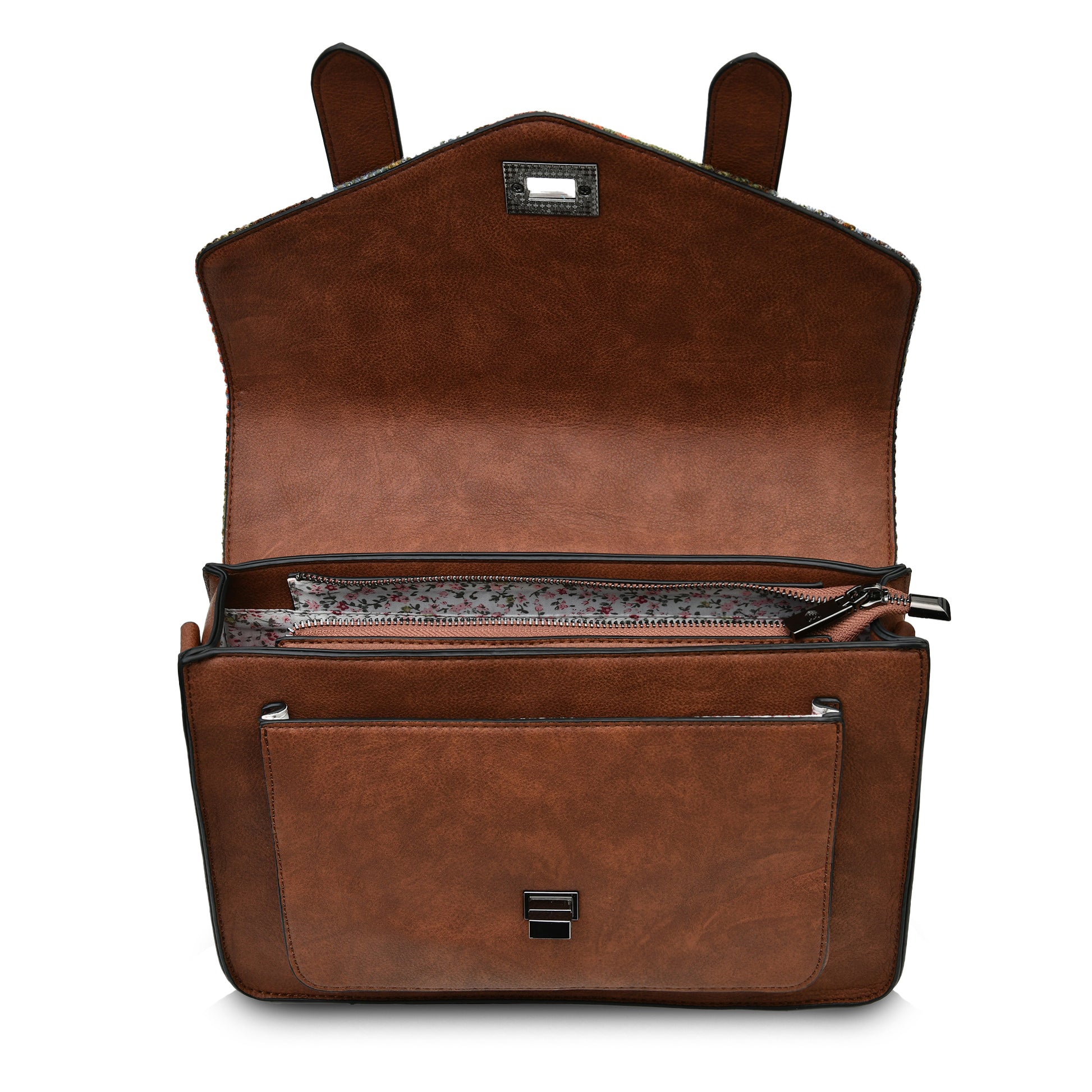 Open view of the Islander satchel displaying the spacious interior and floral patterned lining.