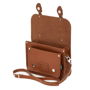 Inside the chestnut brown leather satchel showing the inside pockets.