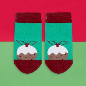 Kids Christmas Pudding Socks in green and red featuring a festive pudding design with holly detail, made from sustainable cotton.
