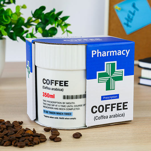 Coffee Pill Mug in pharmacy-style novelty packaging with coffee beans.