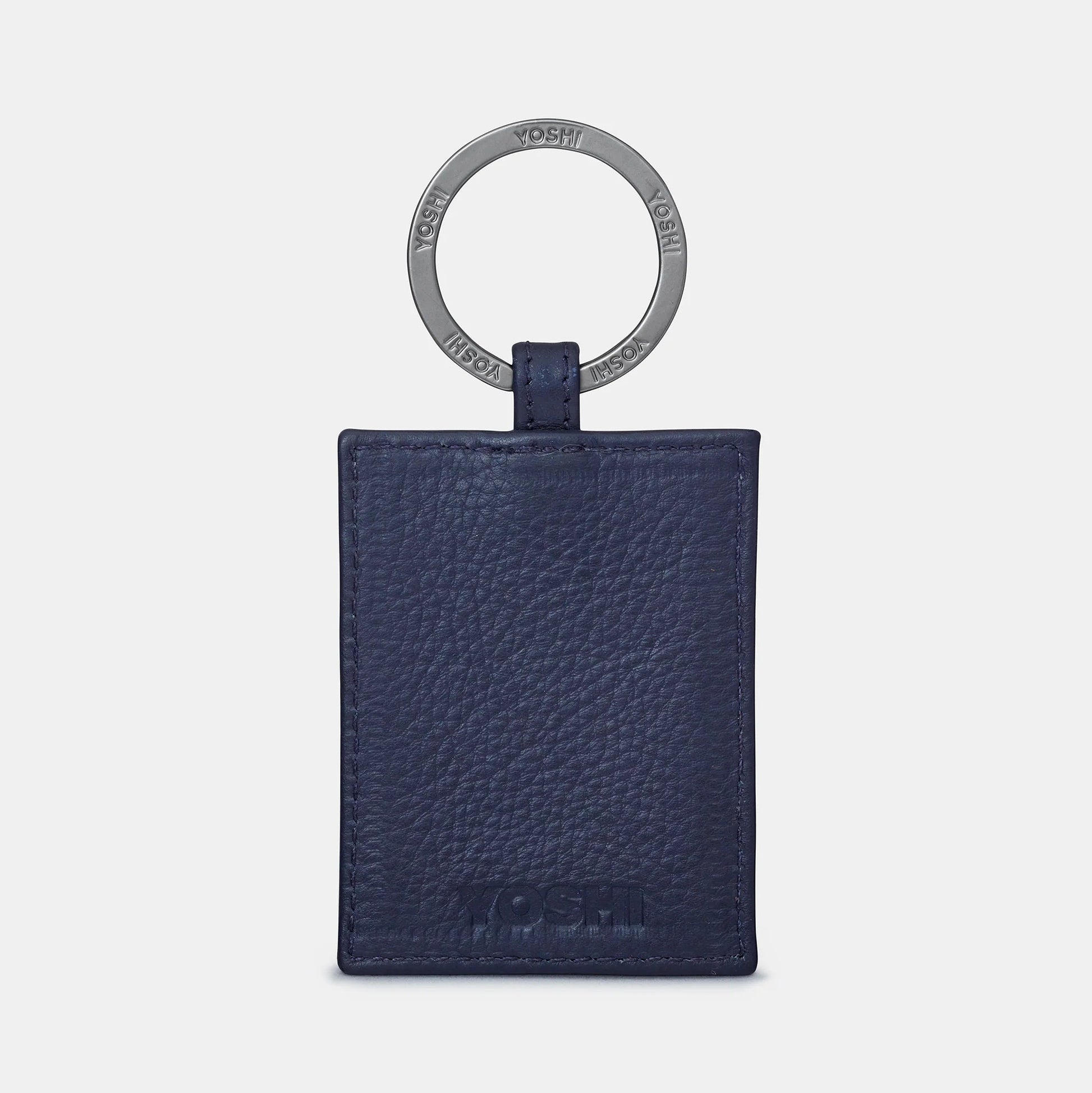 Back view of Cook Bookworm Library Leather Keyring showing smooth navy leather and Yoshi logo.