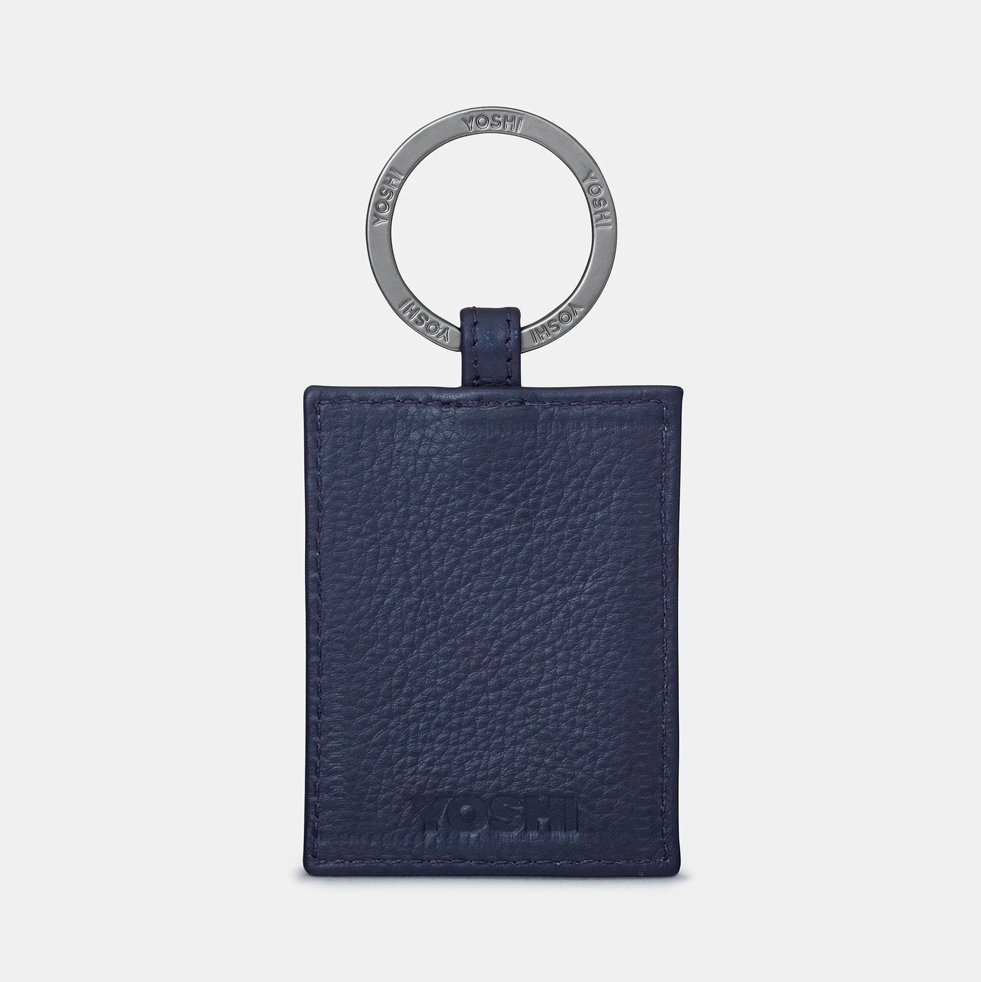 Back view of Cook Bookworm Library Leather Keyring showing smooth navy leather and Yoshi logo.