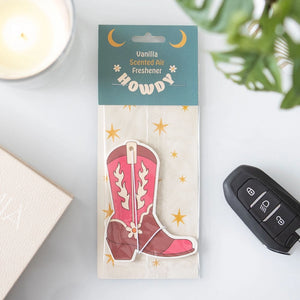 Front packaging view of Cowboy Boot Vanilla Scented Air Freshener featuring a western boot design and “Howdy” text.