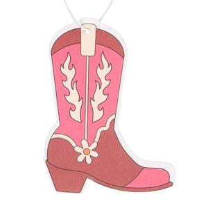 Close-up of the air freshener’s boot shape and floral details, capturing its retro aesthetic.