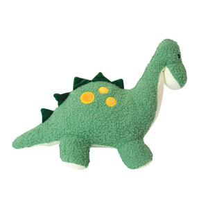 Side view of Dexter the Dinosaur Microwavable Hottie, green plush with yellow embroidered spots.