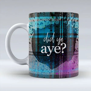 A close-up of the “Did Ye Aye?” mug, showcasing the blue tartan pattern and textured design. The humorous Scottish phrase is prominently displayed, making it a perfect novelty gift.