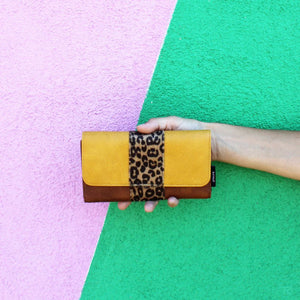 Front view of the Animal Leopard Print Wallet, featuring mustard, tan, and black vegan leather with a faux leopard fur stripe.