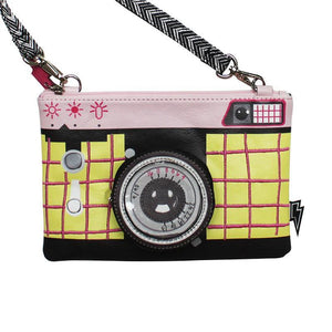 Front view of the Pix Camera Makeup Bag, showcasing the 3D lens detail and vibrant yellow-pink grid design.