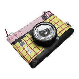 Flat-lay of the Pix Camera Makeup Bag, featuring realistic camera details and detachable strap.