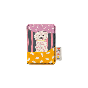 Flat lay of Dog House Dog Card Holder with illustrated dog and yellow polka dot pocket.
