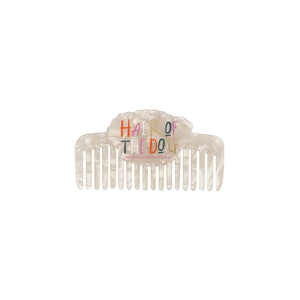 Product shot of pearlescent comb with ‘Hair of the Dog’ wording – Dog House Hair of the Dog Comb back view.