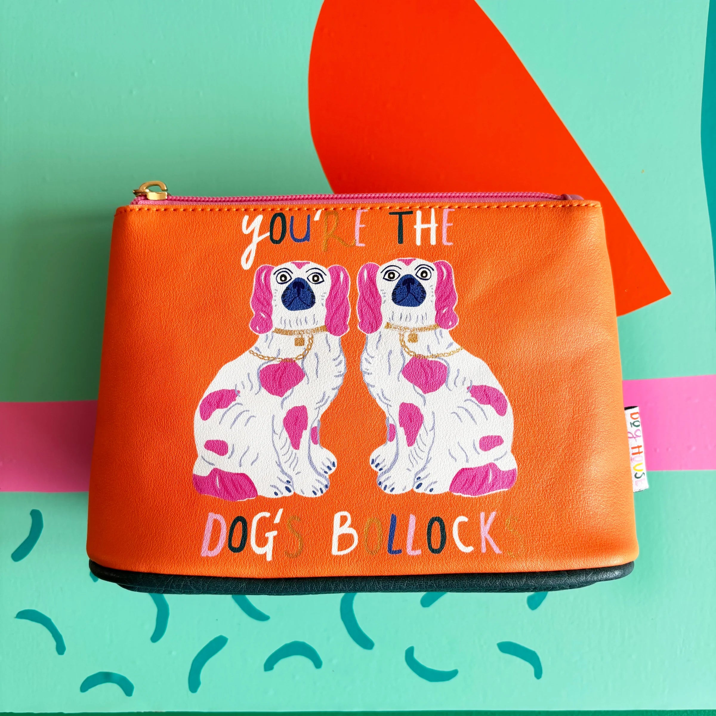 Dogs Bollocks Makeup Bag with orange PVC front and printed dog design.