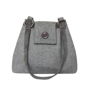 Grey Earth Squared Juniper Anna Bag, showcasing its compact design and adjustable strap.