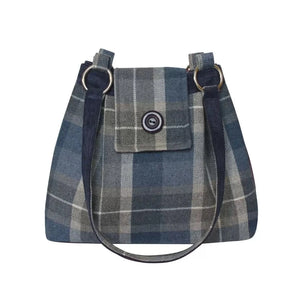 Earth Squared Tweed Ava Bag in Humbie tweed( blue and grey), highlighting its classic silhouette and secure foldover flap with magnetic closure. Perfect for all your essentials.