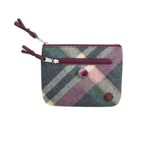 Plaid patterned pouch with a zipper on a white background.