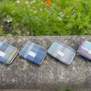 Earth Squared Tweed Wallets: A collection of Earth Squared Tweed Wallets in Carberry, Drem, Inveresk, and Humbie tweed, demonstrating their versatility and style.