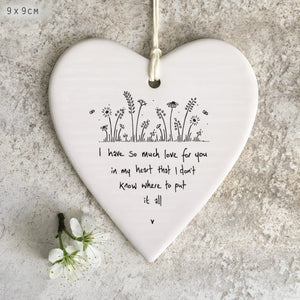 East of India porcelain wobbly heart hanging decoration with wildflower illustration and heartfelt quote – ‘I have so much love for you in my heart that I don’t know where to put it all.’ Perfect sentimental gift.