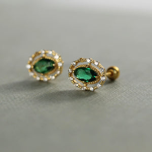 Side view of the Emerald Queen Jewel Stud Earrings with intricate stone details and secure screw-back closure.