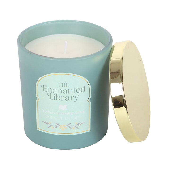 Open Enchanted Library candle in frosted green jar with gold lid – leather, patchouli and amber fragrance.