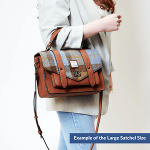 Example of a lady wearing the large Harris Tweed Satchel.