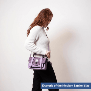 Examples of a lady wearing a medium Harris Tweed satchel.