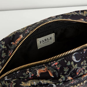 Interior view of the Fable England Woodland Pouch showing its spacious compartment and Fable England fabric label.