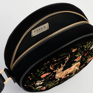 Interior view of Fable England Aurora bag showing gold zip and brand label.