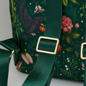 Strap Detail: A close-up of the gold-tone adjustable buckle and green webbing strap, highlighting the bag’s durable and stylish construction.