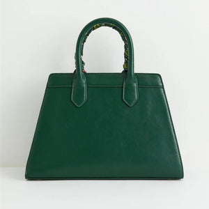 Back View – A minimalist back view of the vegan leather tote, with sturdy structured handles and smooth finish.