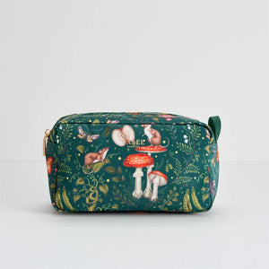 Front view of the Fable England Catherine Rowe Into the Woods Travel Pouch – A green travel pouch featuring a whimsical woodland print with mushrooms, mice, and botanical details.