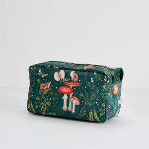 Angled view of the Into the Woods Travel Pouch – Side perspective of the green pouch, showcasing its enchanting woodland pattern and structured design.