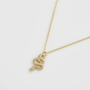 Reverse side of the snake pendant, displaying textured gold-plated scales for a stunning contrast.