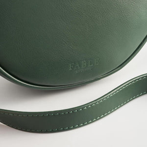 Strap & Branding: Close-up of the adjustable strap and Fable England logo embossed on the back.