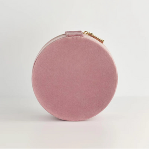 The back of the pink jewellery box, featuring a smooth velvet surface with no embroidery.