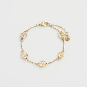 Close-up of the Daisy Chain Bracelet showcasing gold-plated chain with hand-painted daisy charms.