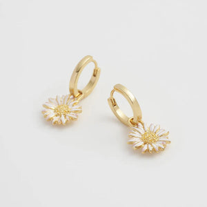 Angle View: Close-up of Daisy Huggie Earrings showcasing intricate floral design.