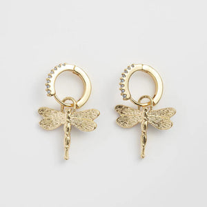 The back view of the earrings, showcasing the textured gold-plated dragonfly design.