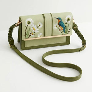 Image 1: A green cross-body bag with an embroidered kingfisher and wildflowers, featuring a gold-toned bar and braided strap details.